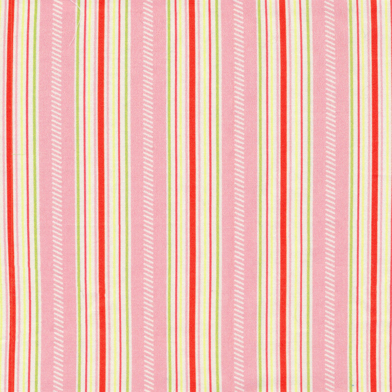Fabric of various stripes in unique sizes, colors, and markings all on a pink background