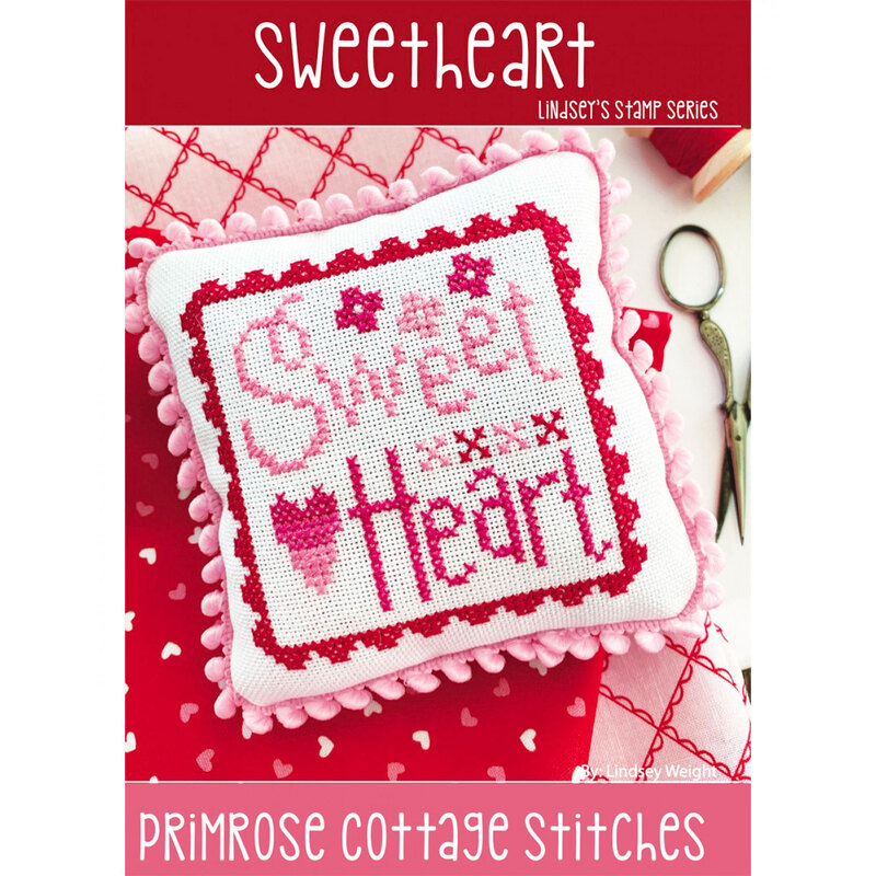Image of Sweetheart Cross stitch pattern embroidered on a pillow trimmed in pink.