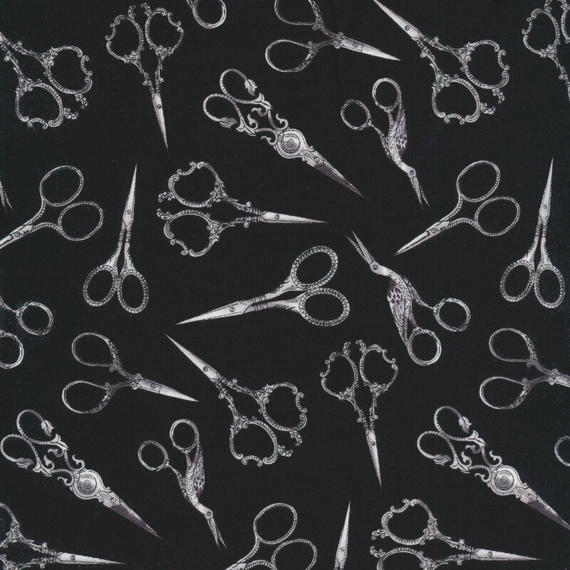 Fabric of antique styled scissors on a black background