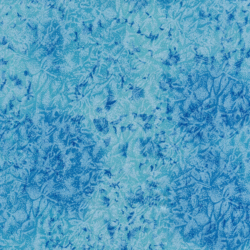 Tonal ocean blue colored fabric features mottled design with metallic accents | Shabby Fabrics