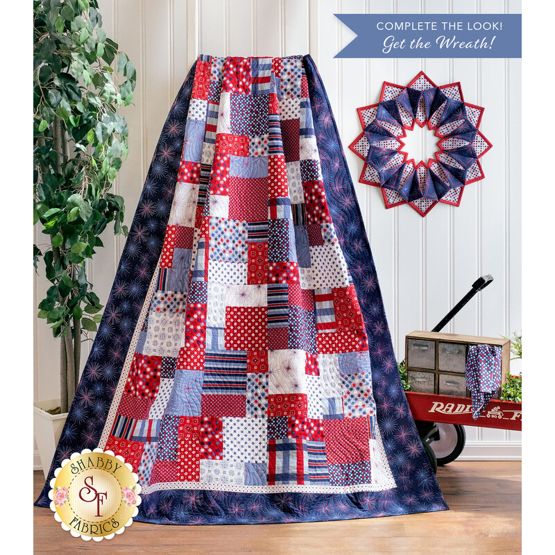 A draped image of the Easy as ABC and 123 Picadilly Quilt next to a wreath.