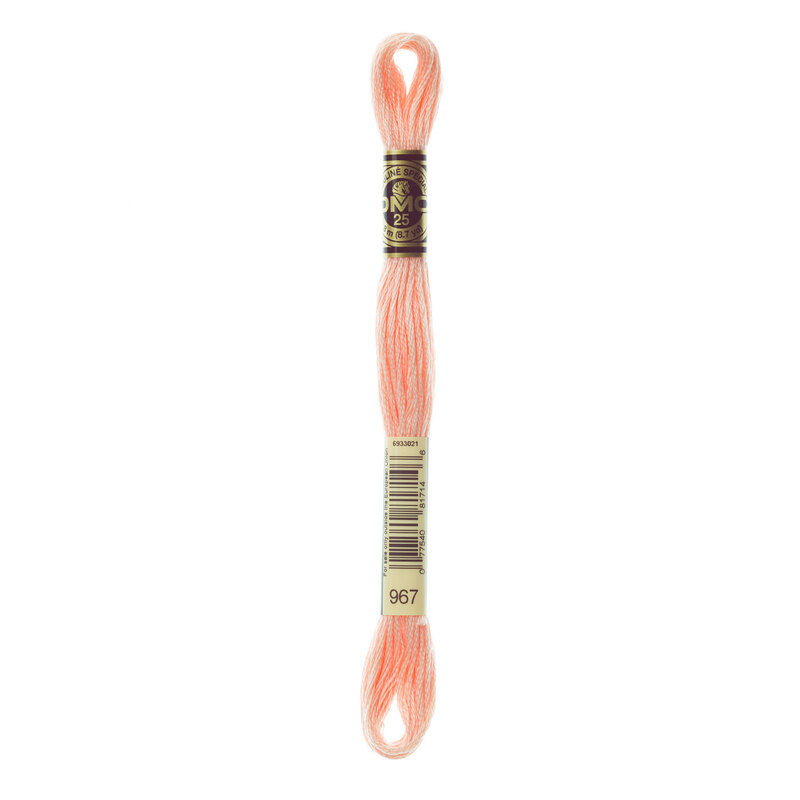 A skein of DMC 967 Very Light Apricot 6 strand embroidery floss
