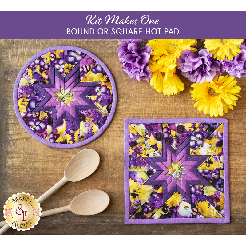 Two hot pads with central folded star design made of purple floral printed fabrics accented with yellow.