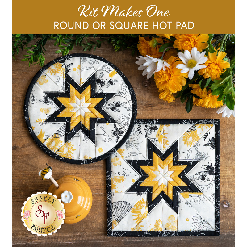 Hot pads with central folded star design made of white bee themed fabrics with black and yellow accents.