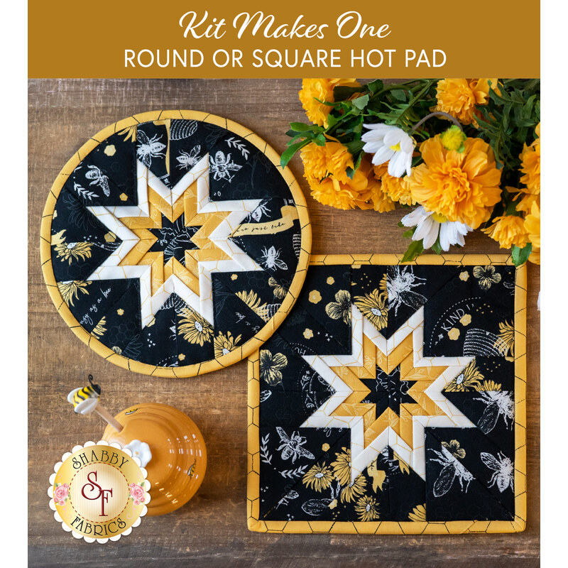 Hot pads with central folded star design made of black bee themed fabrics with black and yellow accents.