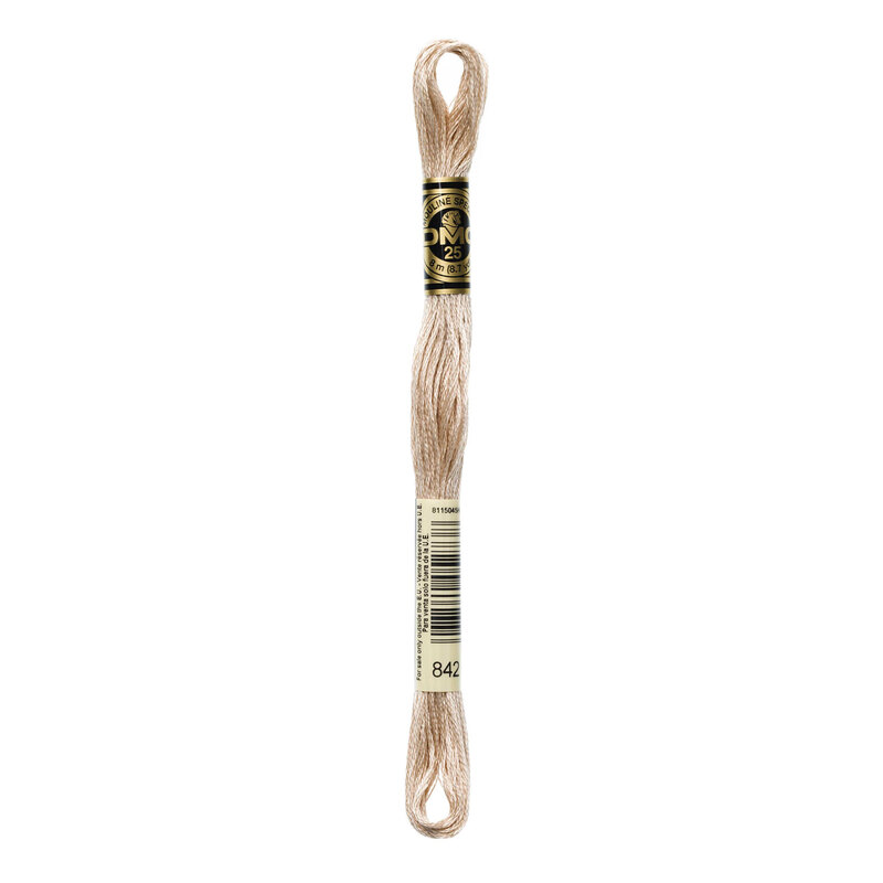 A skein of DMC 842 Very Light Beige Brown 6 strand embroidery floss