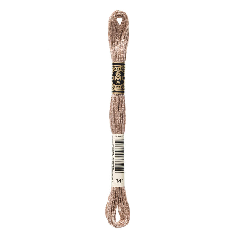 A skein of DMC 841 Light Beige Brown 6 strand embroidery floss