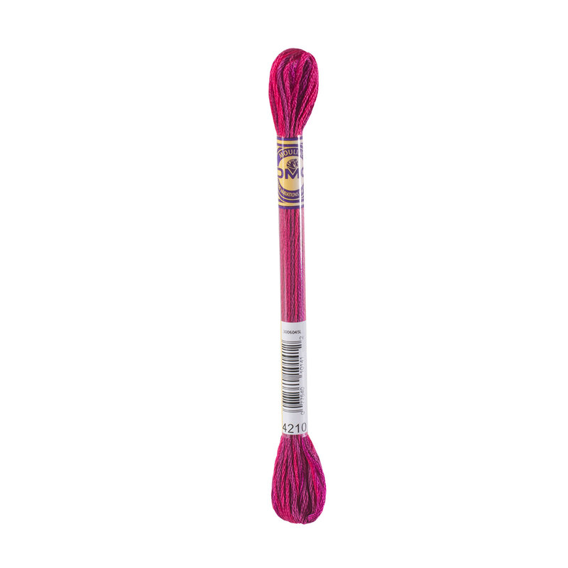 A skein of DMC 4210 Radiant Ruby Color Variations embroidery floss in its packaging