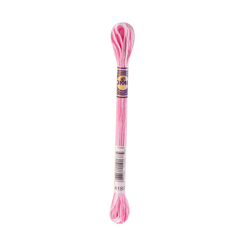 A skein of DMC 4180 Rose Petals Color Variations embroidery floss in its packaging