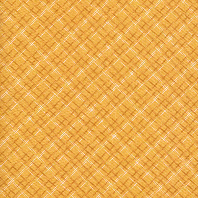 fabric featuring a plaid print on an orange background