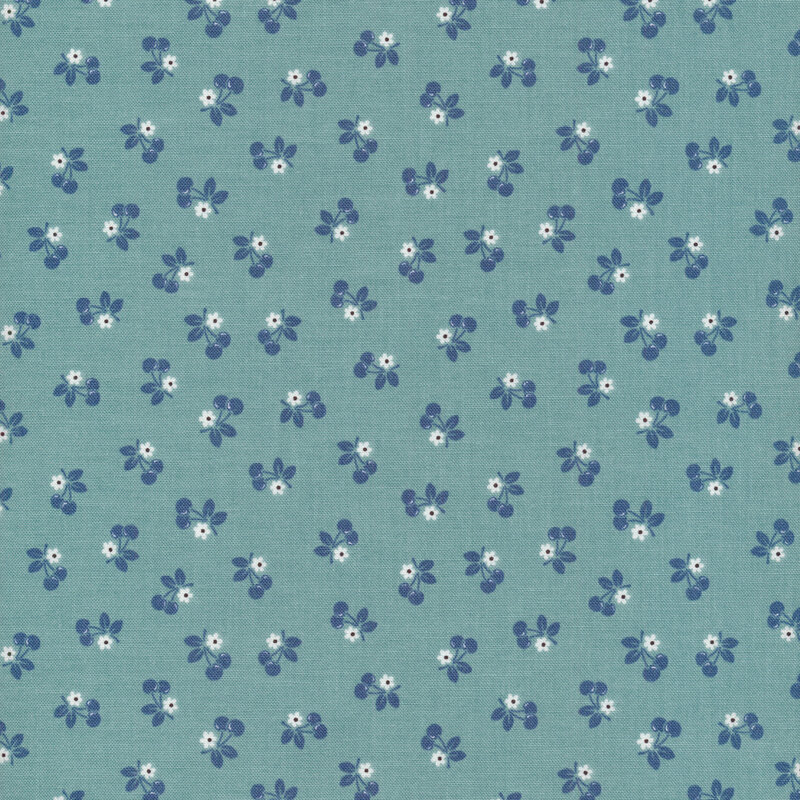 blue fabric featuring small white flowers and blue cherries