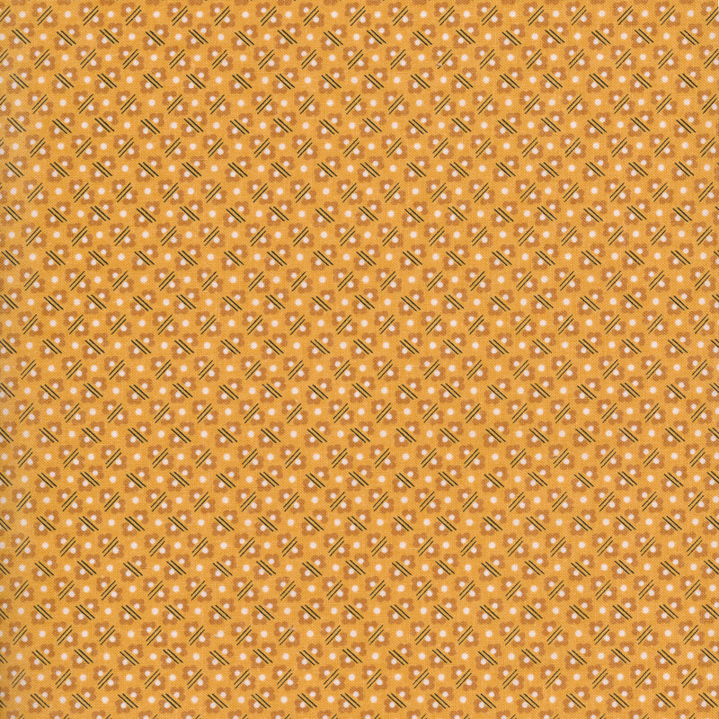 polka dots, flowers and lines on an orange fabric background