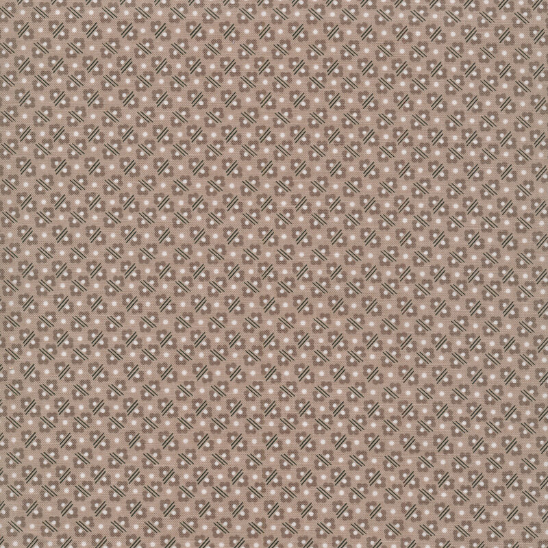 polka dots, flowers and lines on a gray-ish brown fabric background