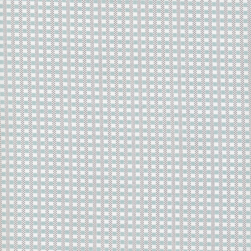 fabric featuring white and blue checkerboard pattern with polka dots