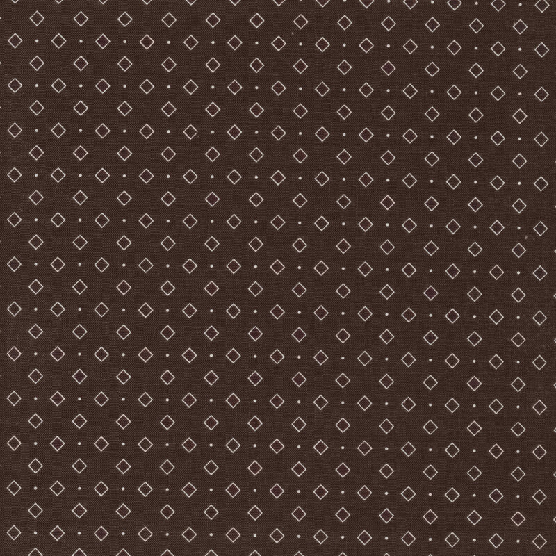 brown fabric featuring squares and polka dots all over
