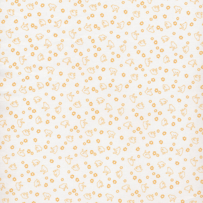 baby yellow chicks and flowers on a white fabric background