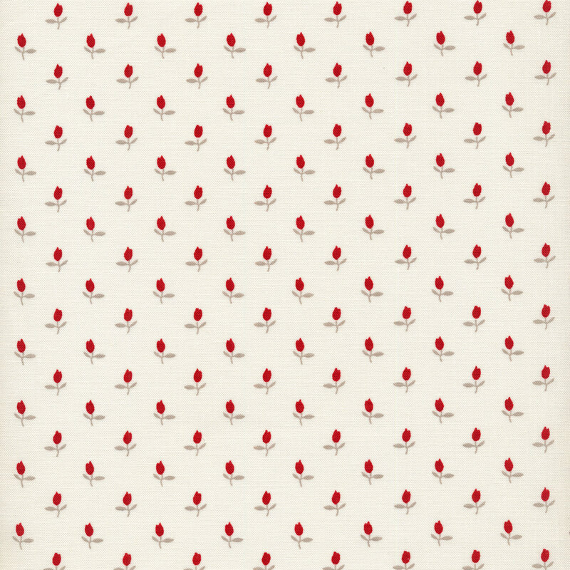 Fabric of a ditsy red rosebud flower print on an off-white background.