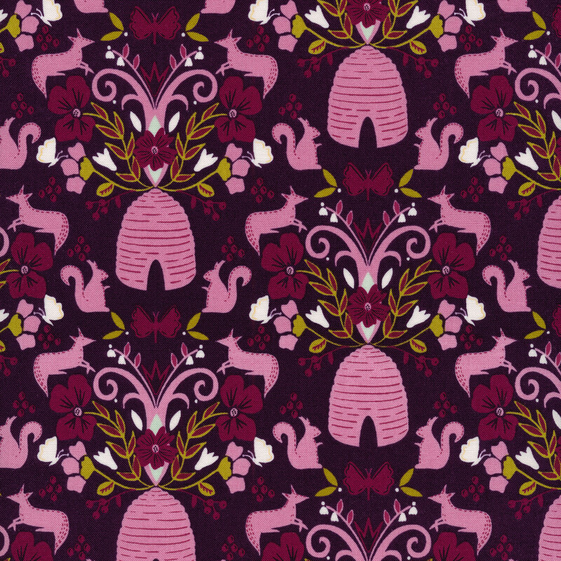 Fabric with a whimsical print of animals, swirls, florals, and vines on a dark purple background