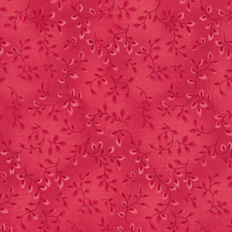 Tonal rose colored fabric with leaves and vines all over