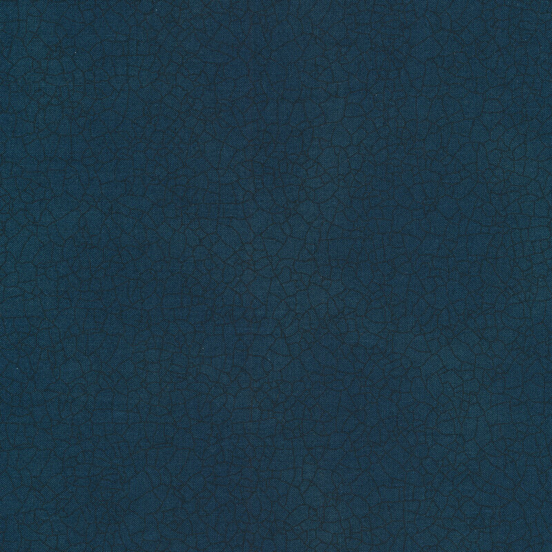 Dark navy cracks all over a dark blue mottled background