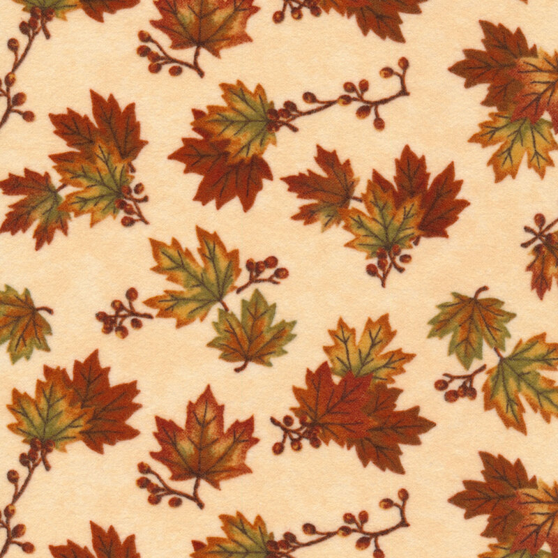 Flannel fabric of maple leaves and sprigs on a cream background.