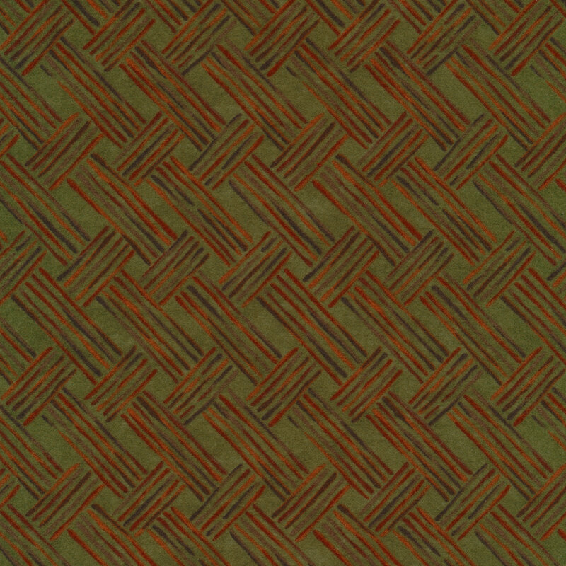 Flannel fabric of a basket weave plaid pattern on a green background.