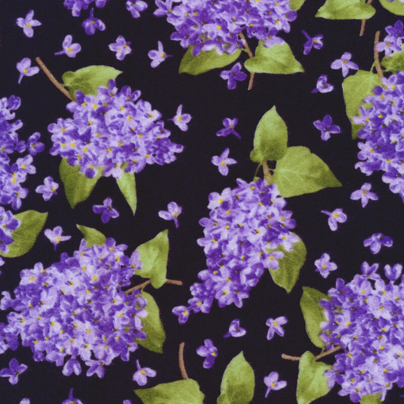 Fabric of clusters of lilacs on a dark purple background.
