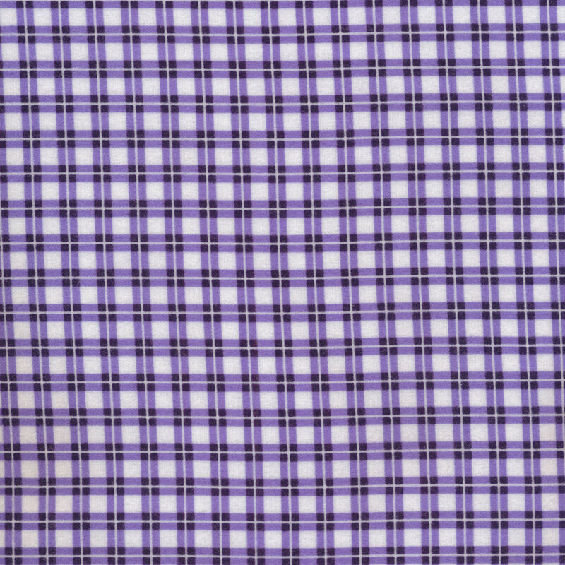 Fabric of a dark purple gingham print with small white pinstripes running through, on a white background.