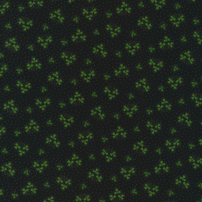 Black fabric with green shamrock clusters and white dots all over
