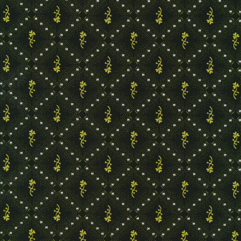 Black plaid fabric with small green shamrock sprigs.