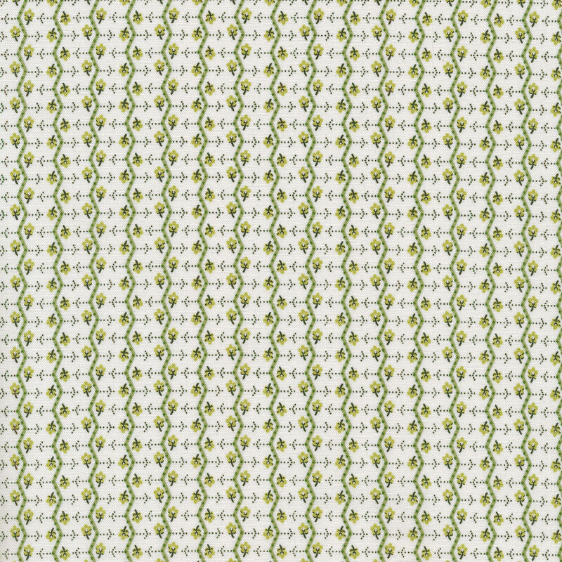 White fabric with small green flowers and green zig zag stripes