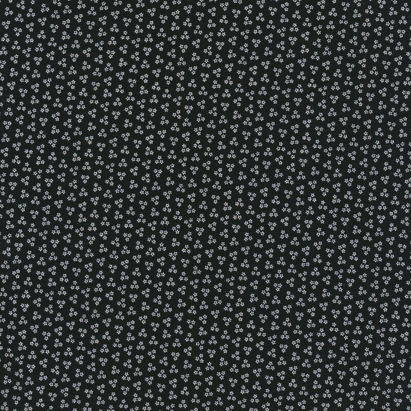 Solid black fabric with small white star clusters all over