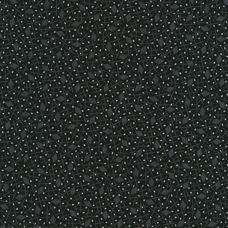 Black fabric with small white diamonds and gray geometric shapes all over