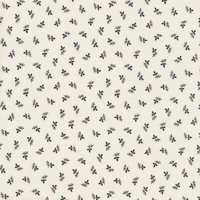 Cream fabric with small black flower buds all over