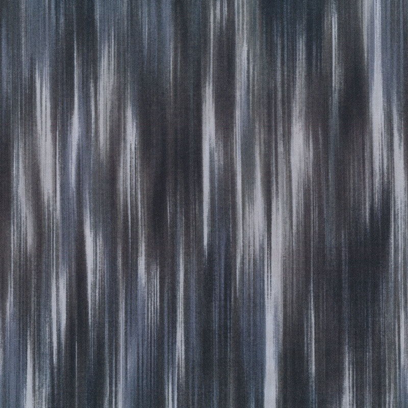 Tonal blue gray fabric in a mottled jagged striped pattern