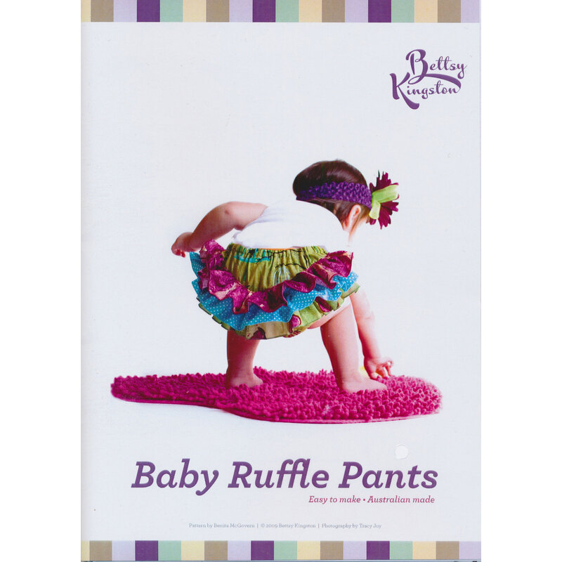 The front of the baby ruffle pants pattern booklet with a baby wearing multicolored ruffle pants