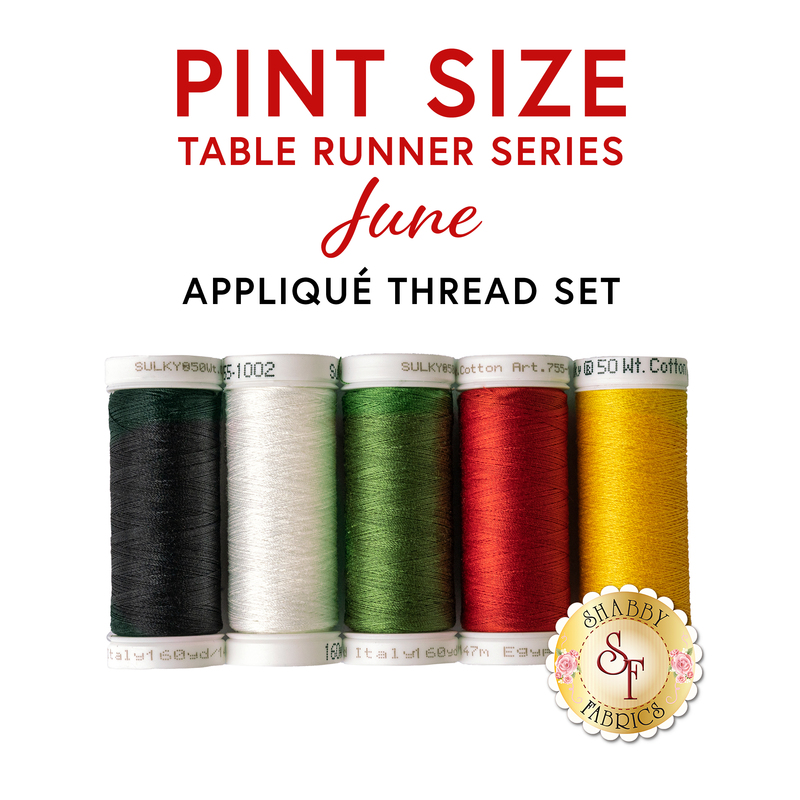 Five spools of thread in various colors.