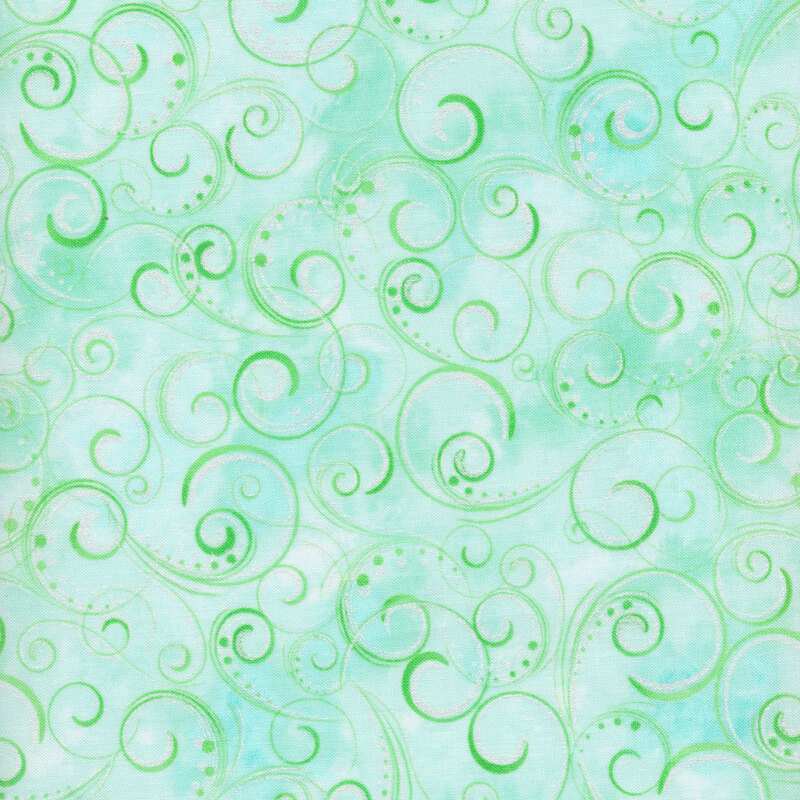 Light aqua mottled fabric with green swirls and dots all over