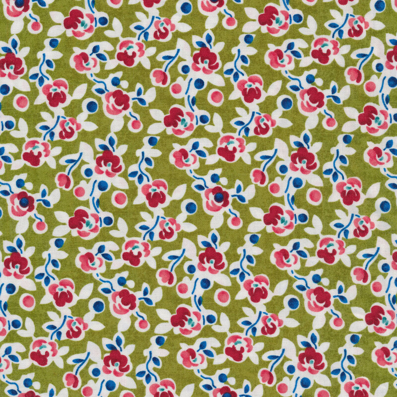 Green fabric with tossed red and blue flowers all over