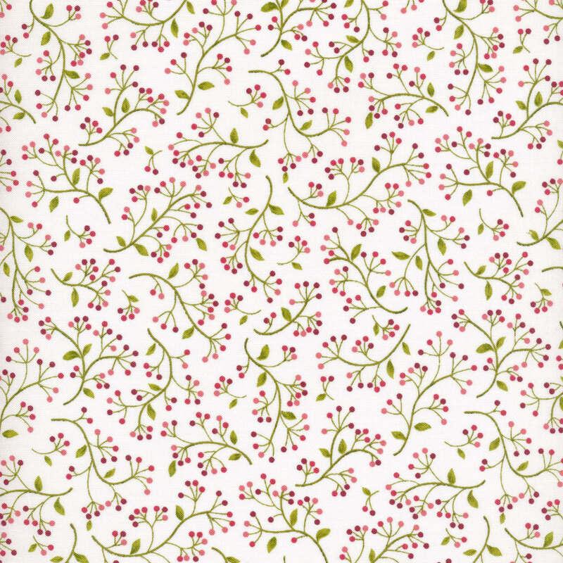 White fabric with green vines and red berries all over