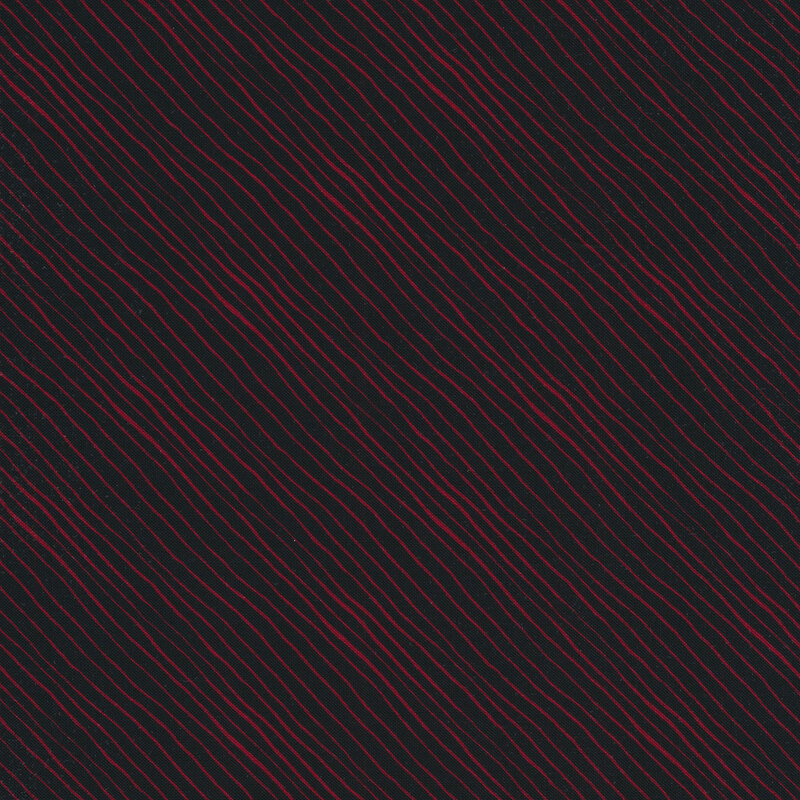 Fabric with red diagonal stripes on black
