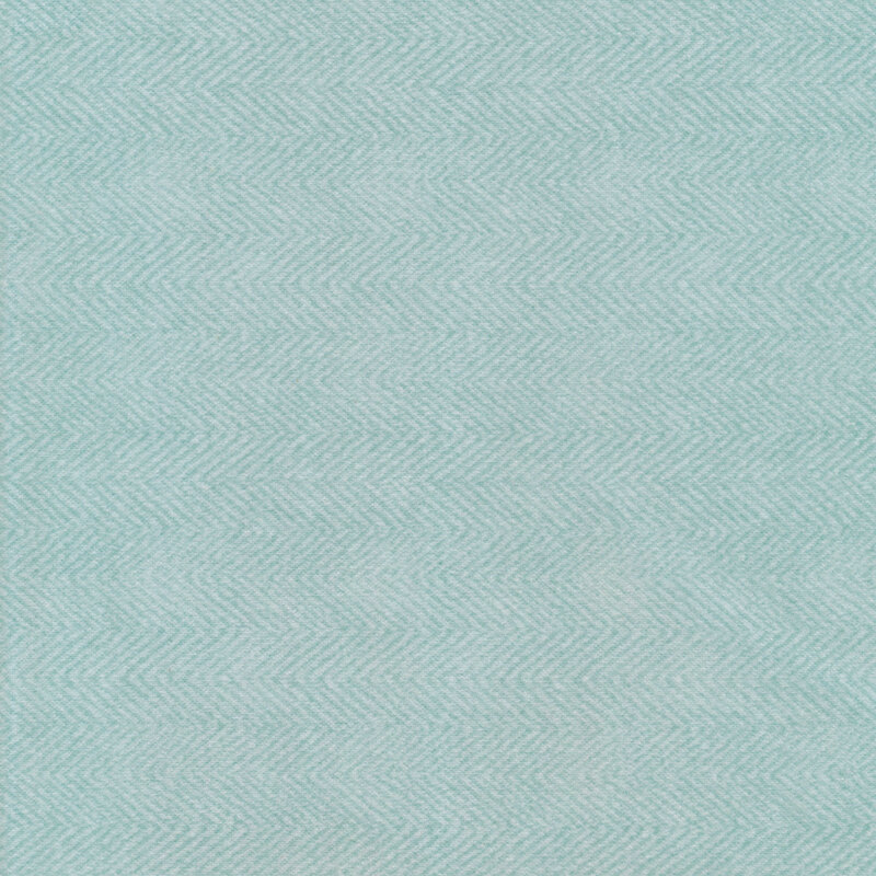 light blue flannel herringbone fabric with a chevron pattern