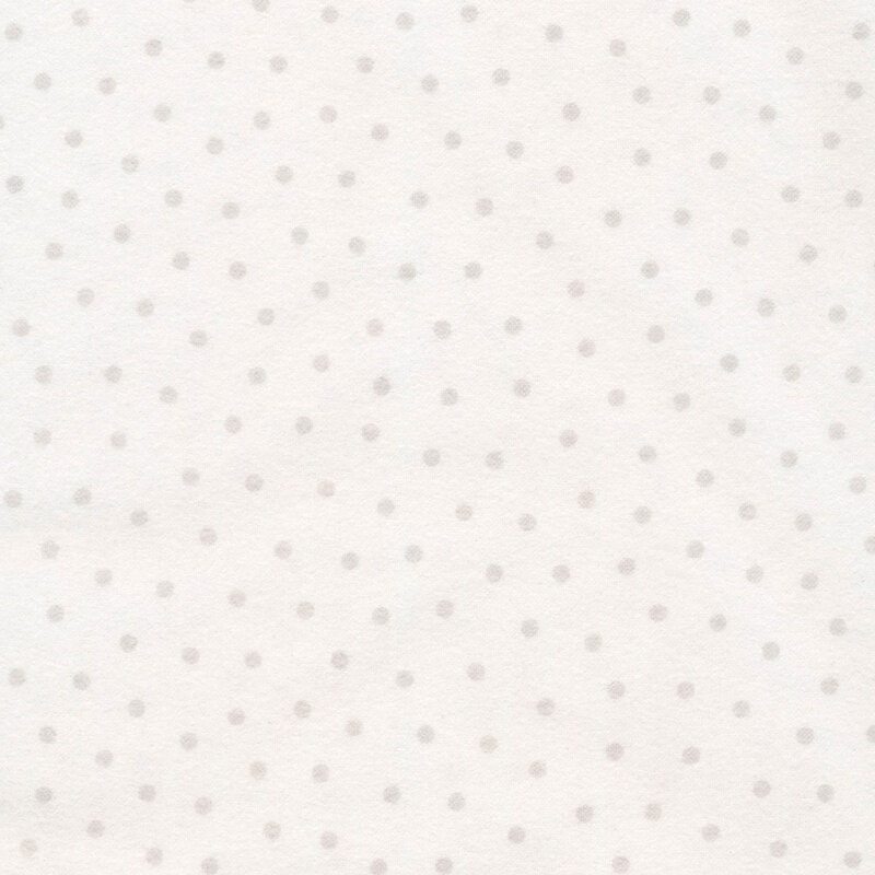 white flannel fabric with pale grey polka dots all over