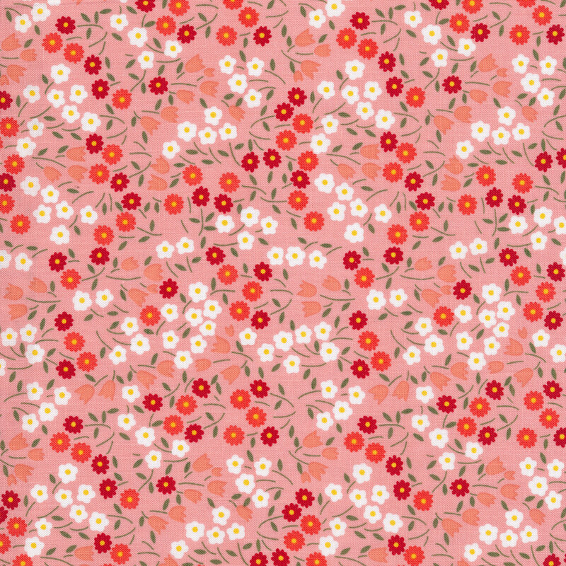 peach fabric with red, white and pink flowers scattered all over