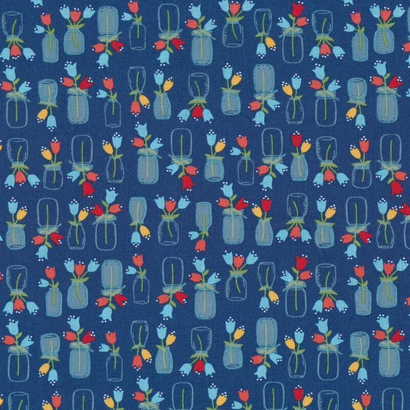 navy blue fabric featuring jars of flowers scattered all over 