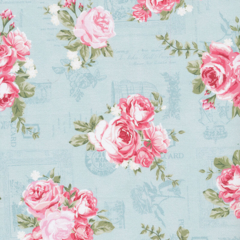 bouquets of pink roses on a tonal aqua fabric background