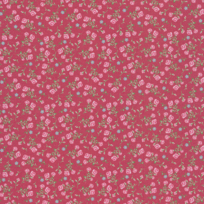 red fabric with pink and blue flowers scattered all over