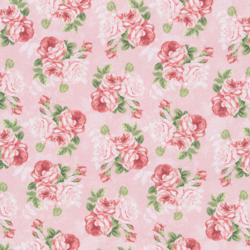 clusters of pink roses all over a light pink fabric background