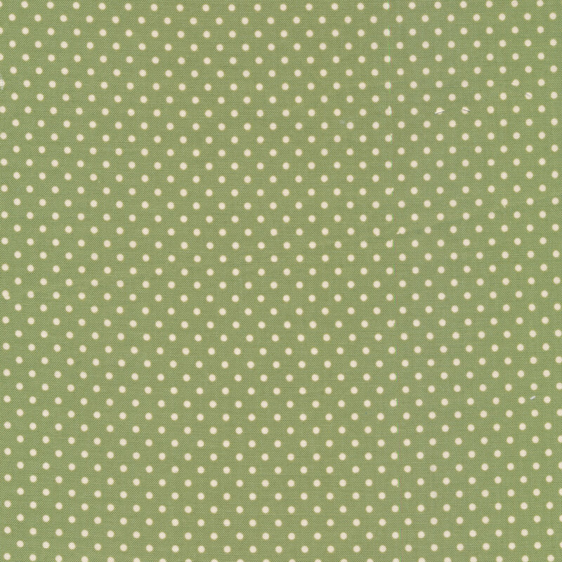 green fabric with polka dots 