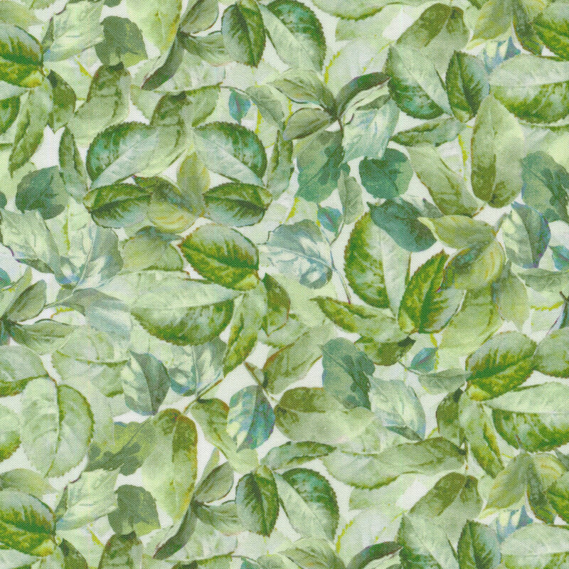 green leaves all over a fabric background